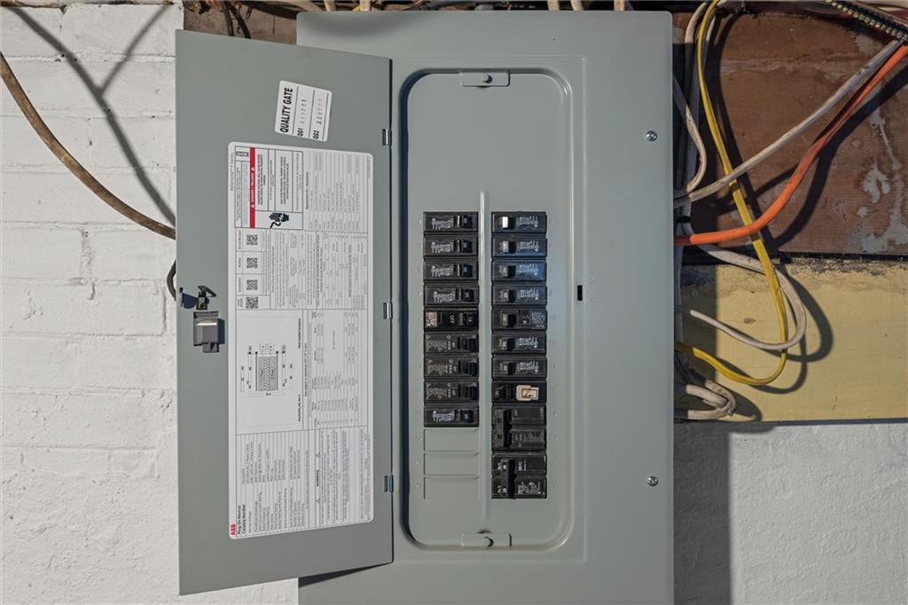 519 Lacock Street Rochester, PA 15074 - Photo 31 of 33 breaker box in basement - mostly updated romex wiring