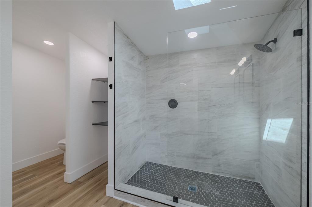 8301 Henry George Road Plant City, FL 33567 - Photo 25 of 51 a bathroom with a shower