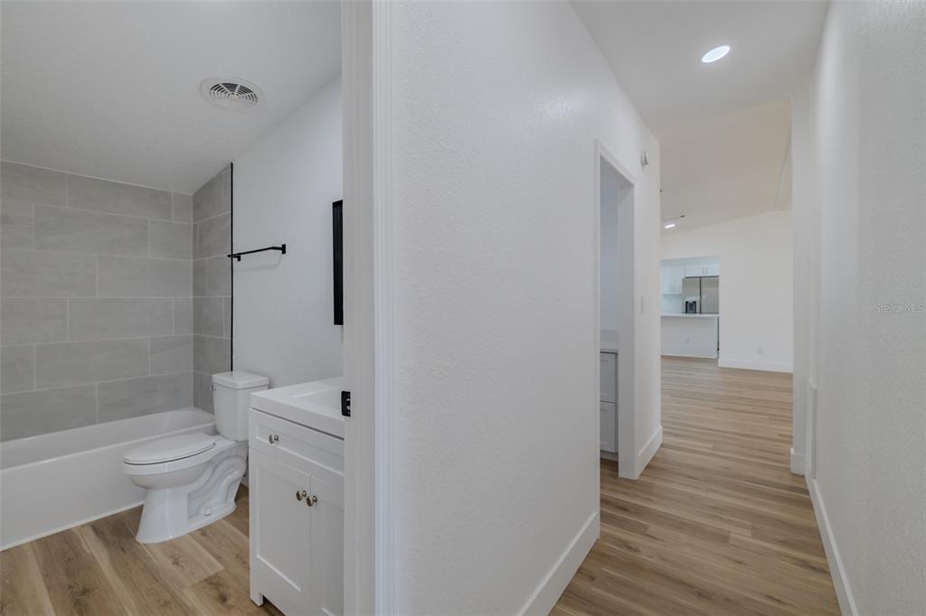 8301 Henry George Road Plant City, FL 33567 - Photo 30 of 51 a bathroom with a toilet and a shower