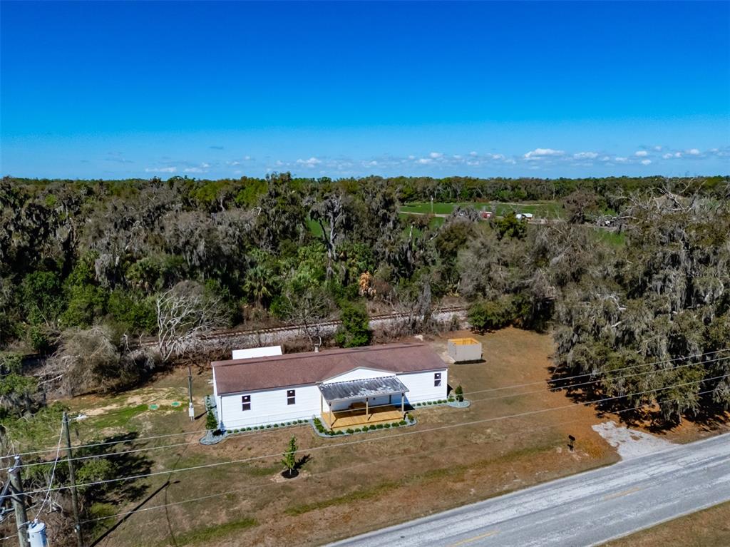8301 Henry George Road Plant City, FL 33567 - Photo 41 of 51 an aerial view of a house with outdoor space