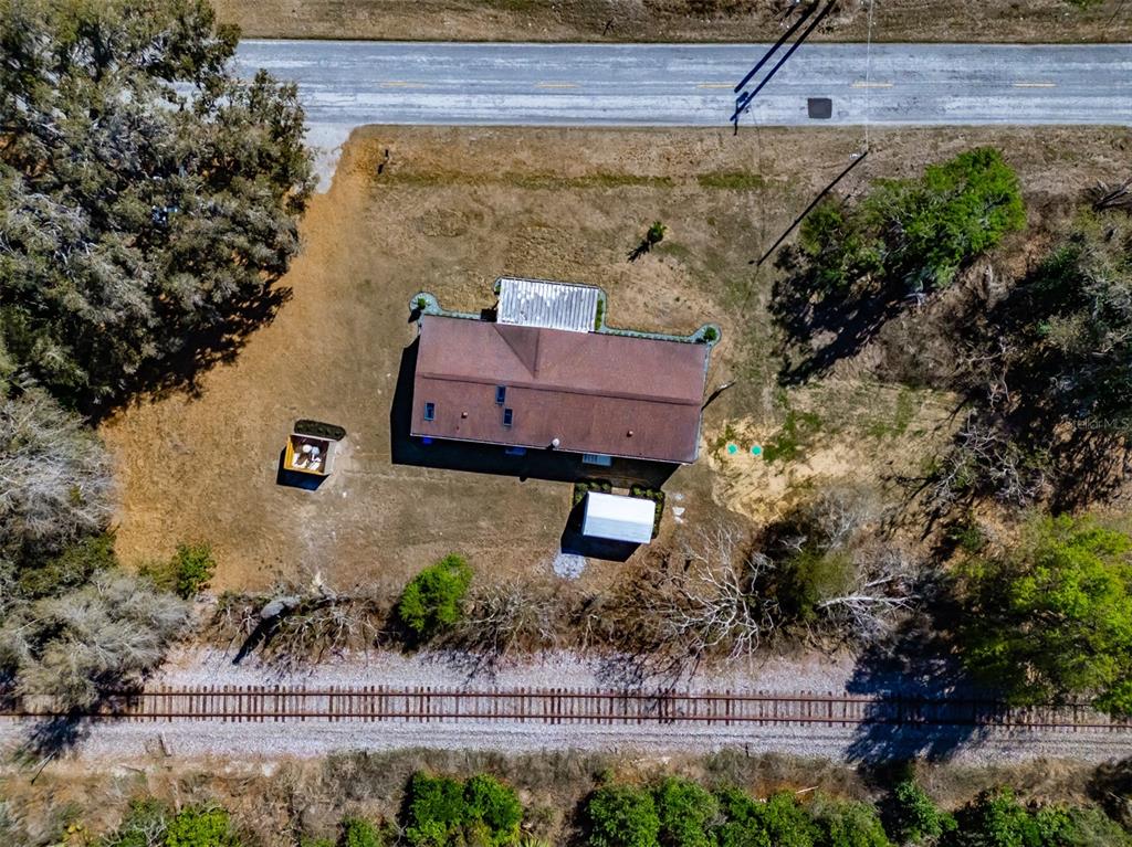 8301 Henry George Road Plant City, FL 33567 - Photo 44 of 51 an aerial view of a house with a yard