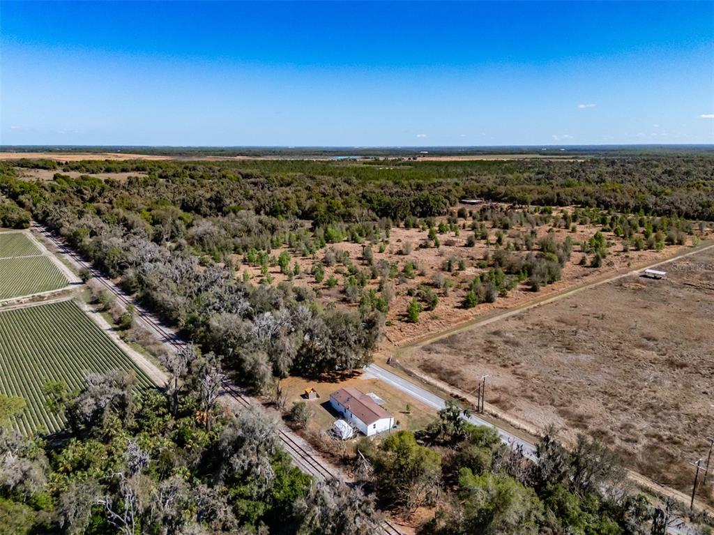 8301 Henry George Road Plant City, FL 33567 - Photo 46 of 51 an aerial view of a city with lots of residential buildings