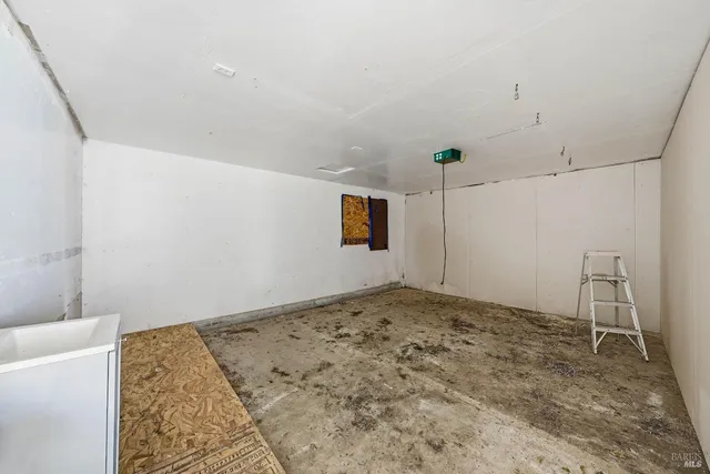 a front view of house with yard and outdoor seating