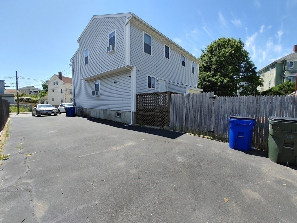 389 4th Street Fall River, MA 02721 - Photo 23 of 30 a large house with a large space in front of it