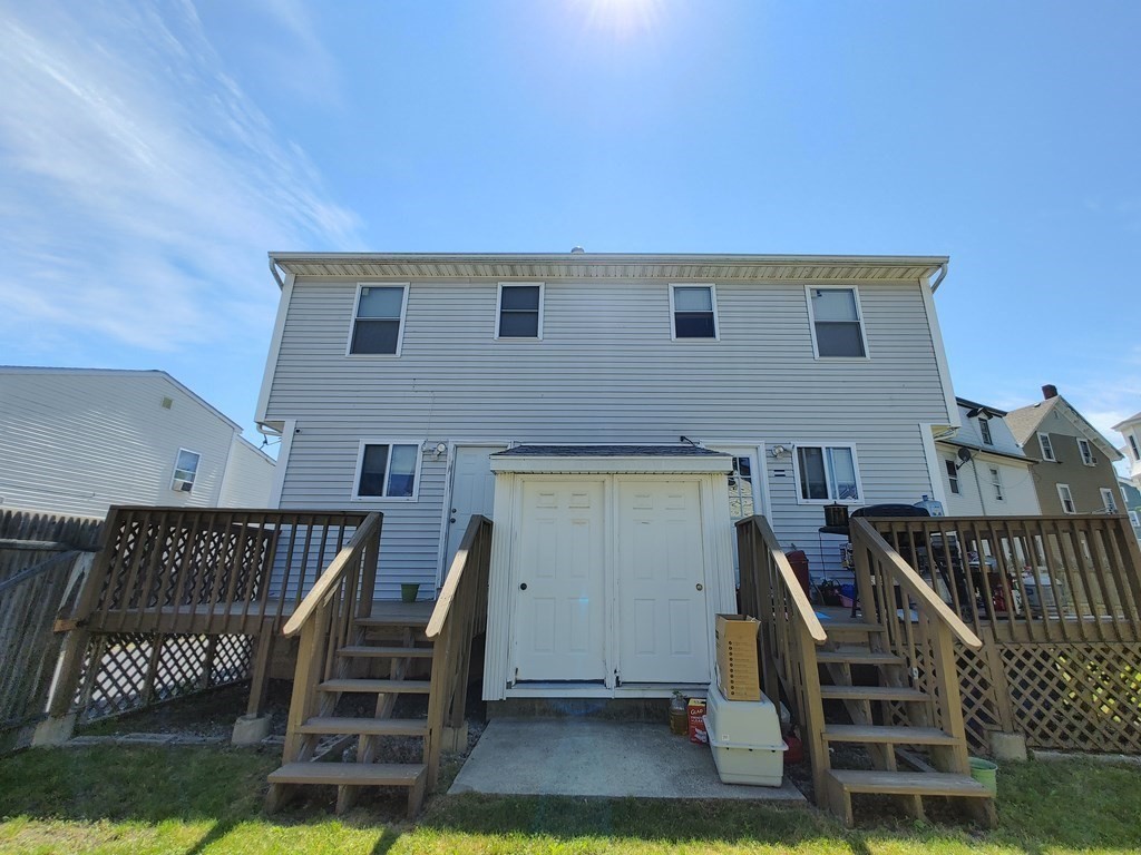 389 4th Street Fall River, MA 02721 - Photo 25 of 30 a view of entryway with wooden stairs
