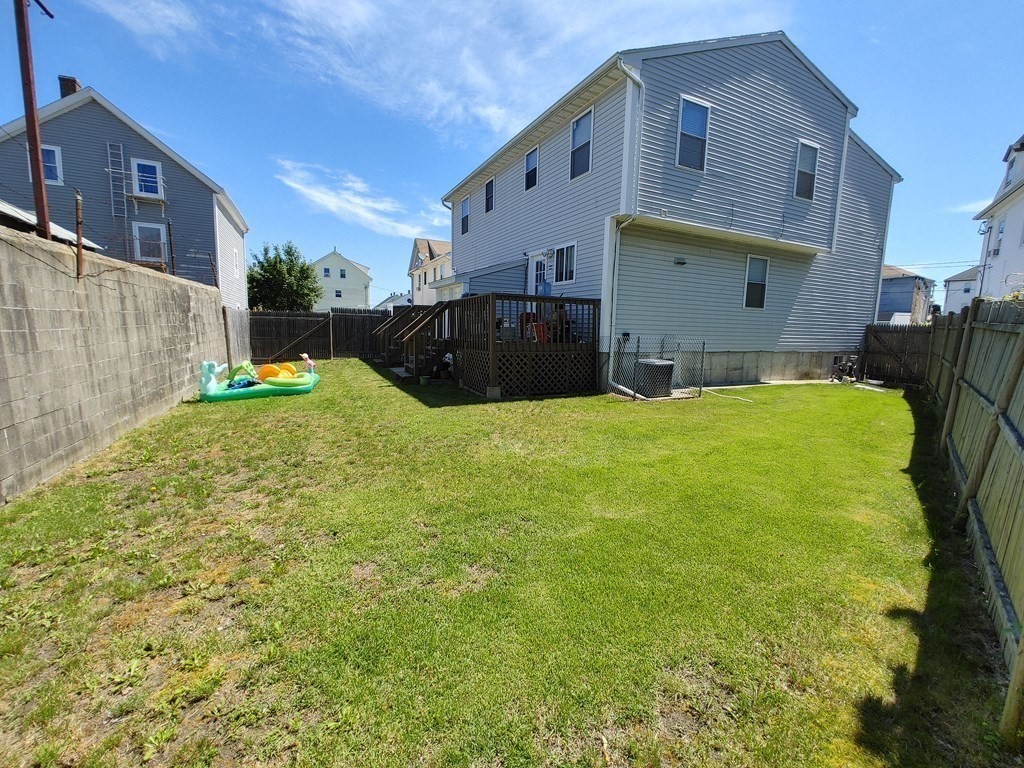 389 4th Street Fall River, MA 02721 - Photo 27 of 30 a swimming pool with yard and outdoor seating