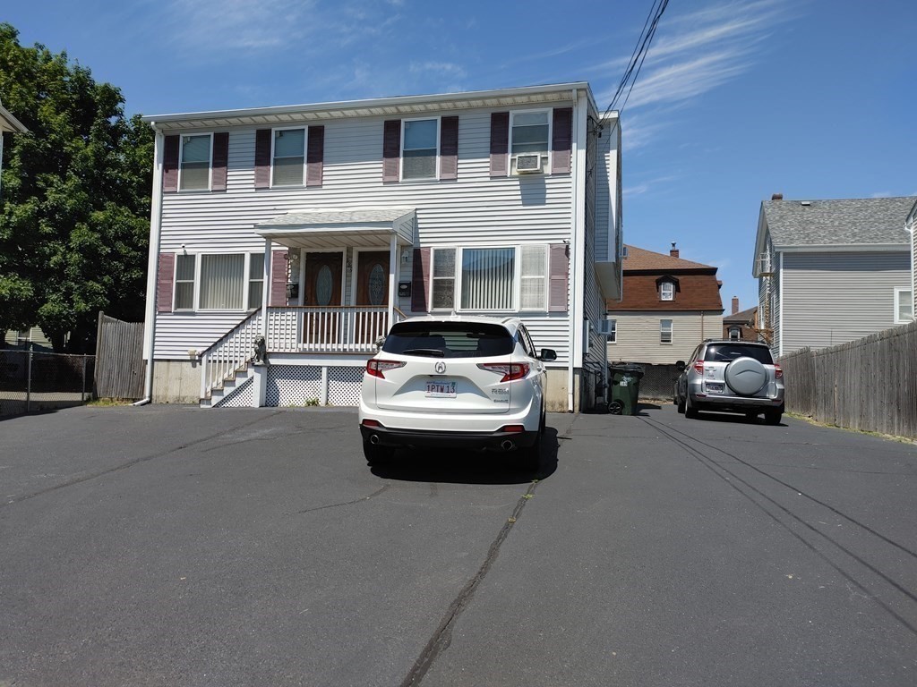 389 4th Street Fall River, MA 02721 - Photo 4 of 30 a car parked in front of a building