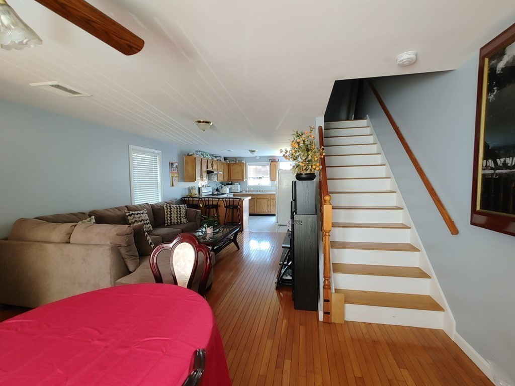 389 4th Street Fall River, MA 02721 - Photo 8 of 30 a living room with furniture and wooden floor