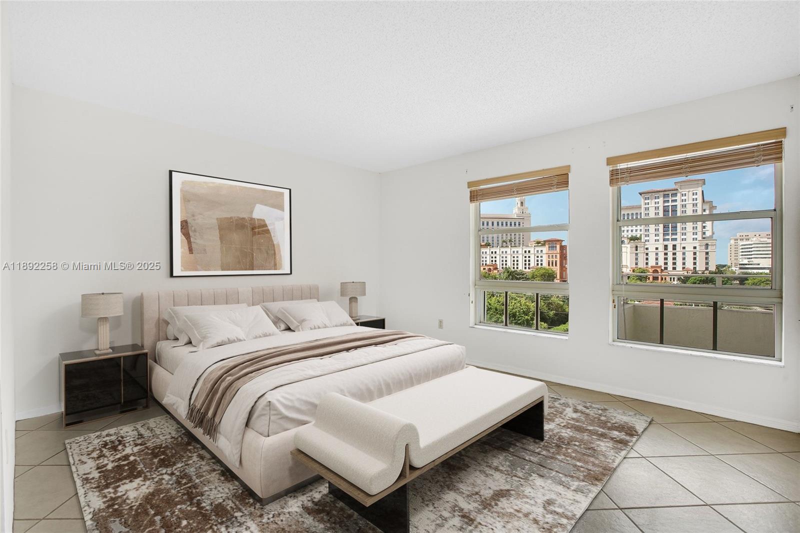 2351 Douglas Road, Unit 604 Miami, FL 33145 - Photo 11 of 26 a spacious bedroom with a bed and glass window