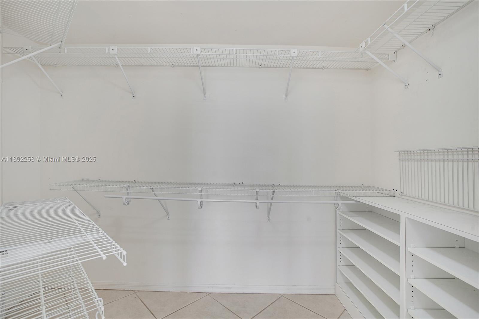 2351 Douglas Road, Unit 604 Miami, FL 33145 - Photo 16 of 26 a view of a room with racks on the wall