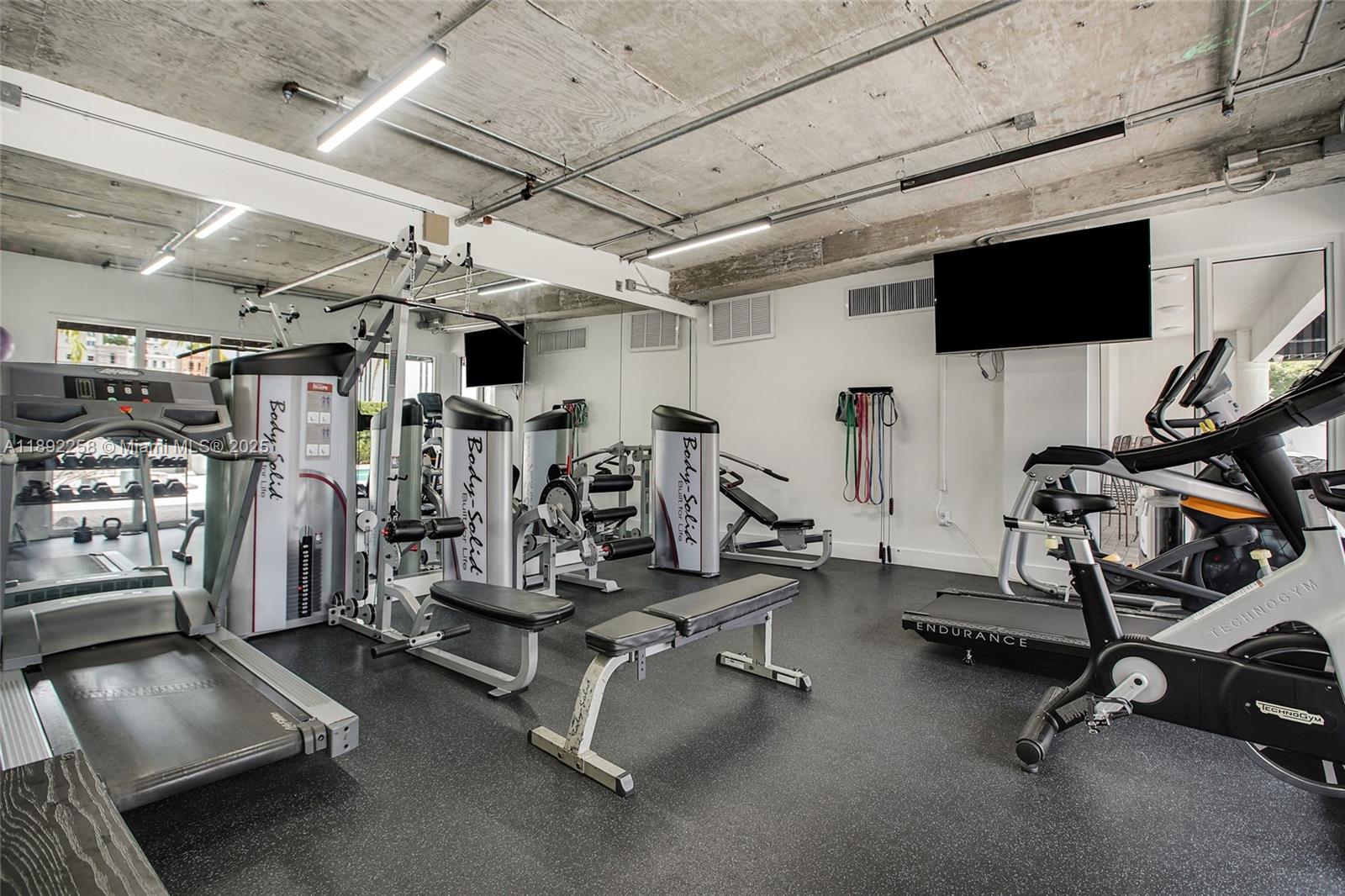 2351 Douglas Road, Unit 604 Miami, FL 33145 - Photo 23 of 26 a view of a room with gym equipment