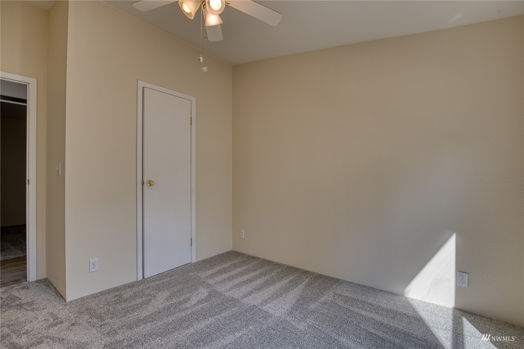 1019 Stanford Drive, Unit 26 Cosmopolis, WA 98537 - Photo 11 of 20 a view of an empty room and chandelier fan