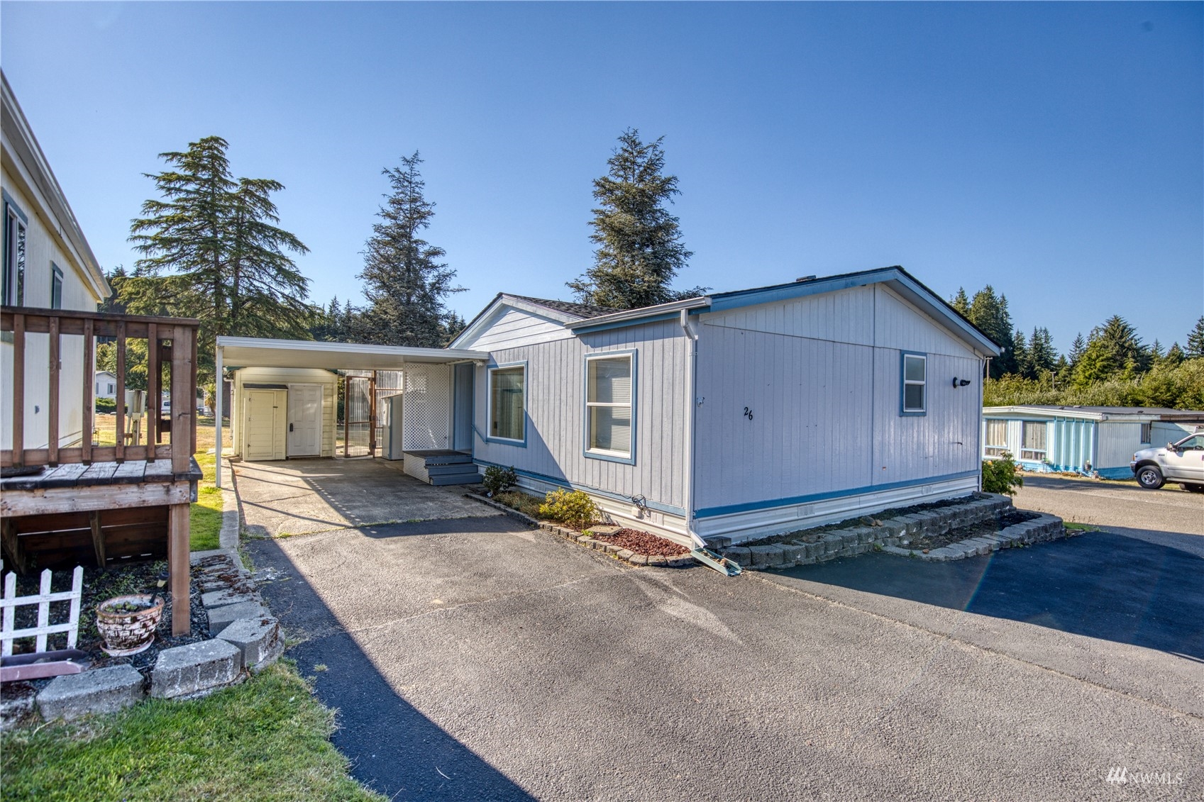 1019 Stanford Drive, Unit 26 Cosmopolis, WA 98537 - Photo 17 of 20 a view of house with outdoor space and sitting area