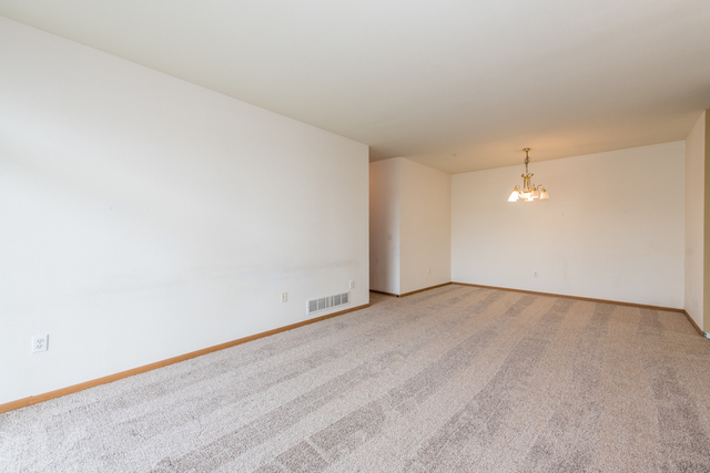 6739 Meadowlands Circle, Unit 6A Pleasant Prairie, WI 53158 - Photo 12 of 19 an empty room with an entryway