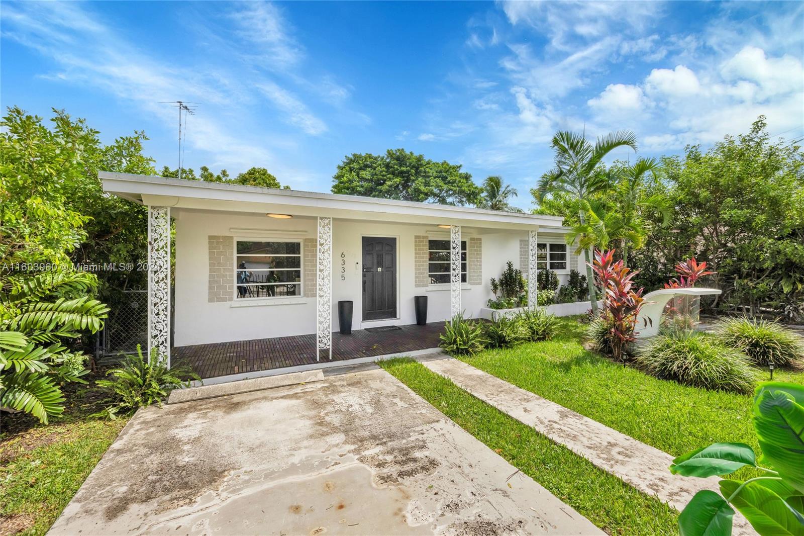 6335 Southwest 33rd Street Miami, FL 33155 - Photo 2 of 37 Double driveway.