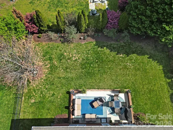 an outdoor space with lots of trees