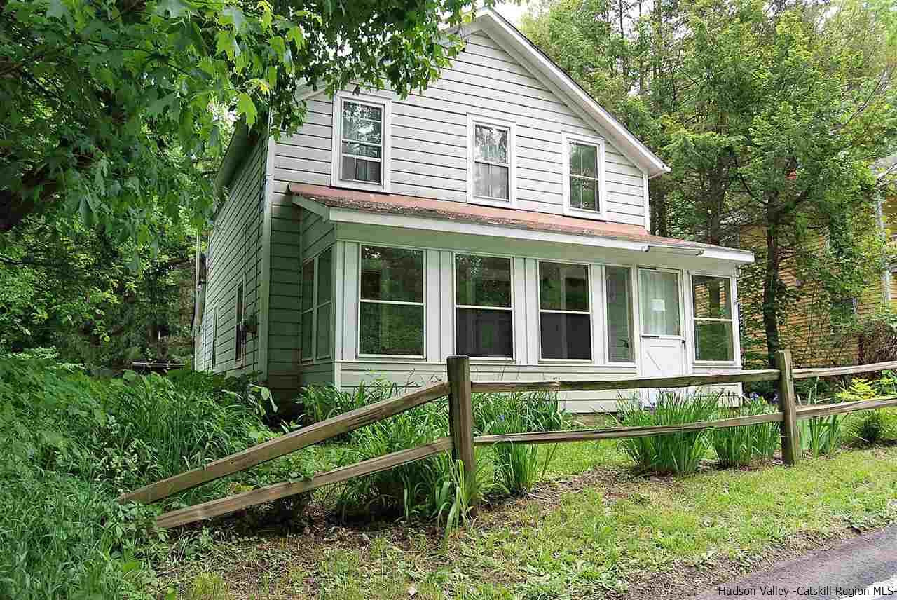 3424 Cooper Street Stone Ridge, NY 12484 - Photo 1 of 24 front view of a house with a yard