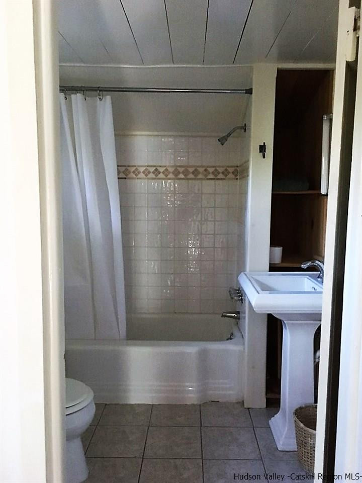 3424 Cooper Street Stone Ridge, NY 12484 - Photo 9 of 24 a bathroom with a shower and a toilet