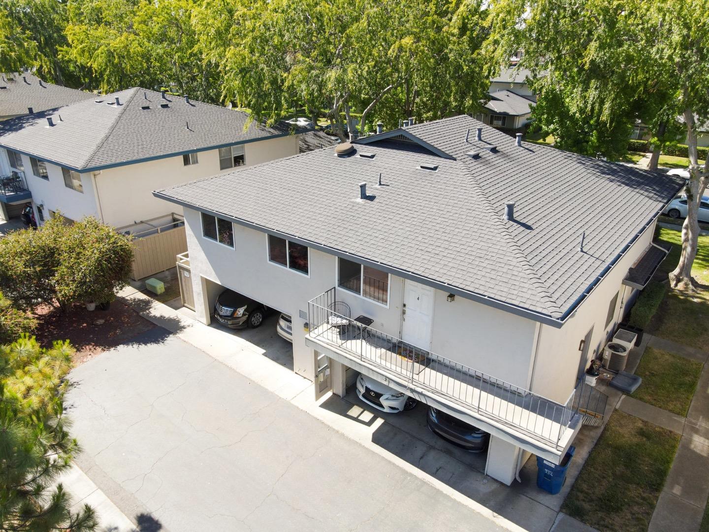 230 Watson Drive, Unit 4 Campbell, CA 95008 - Photo 16 of 17 an aerial view of a house with a yard