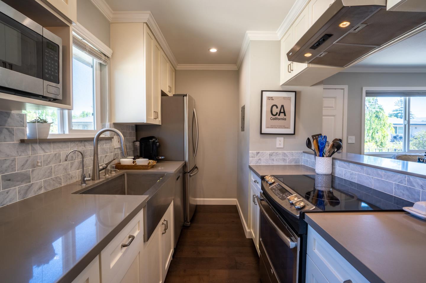 230 Watson Drive, Unit 4 Campbell, CA 95008 - Photo 3 of 17 a kitchen with stainless steel appliances granite countertop a sink stove and refrigerator