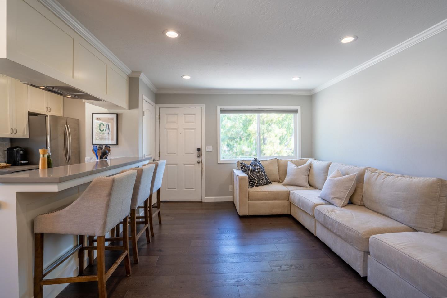 230 Watson Drive, Unit 4 Campbell, CA 95008 - Photo 8 of 17 a living room with furniture and a large window