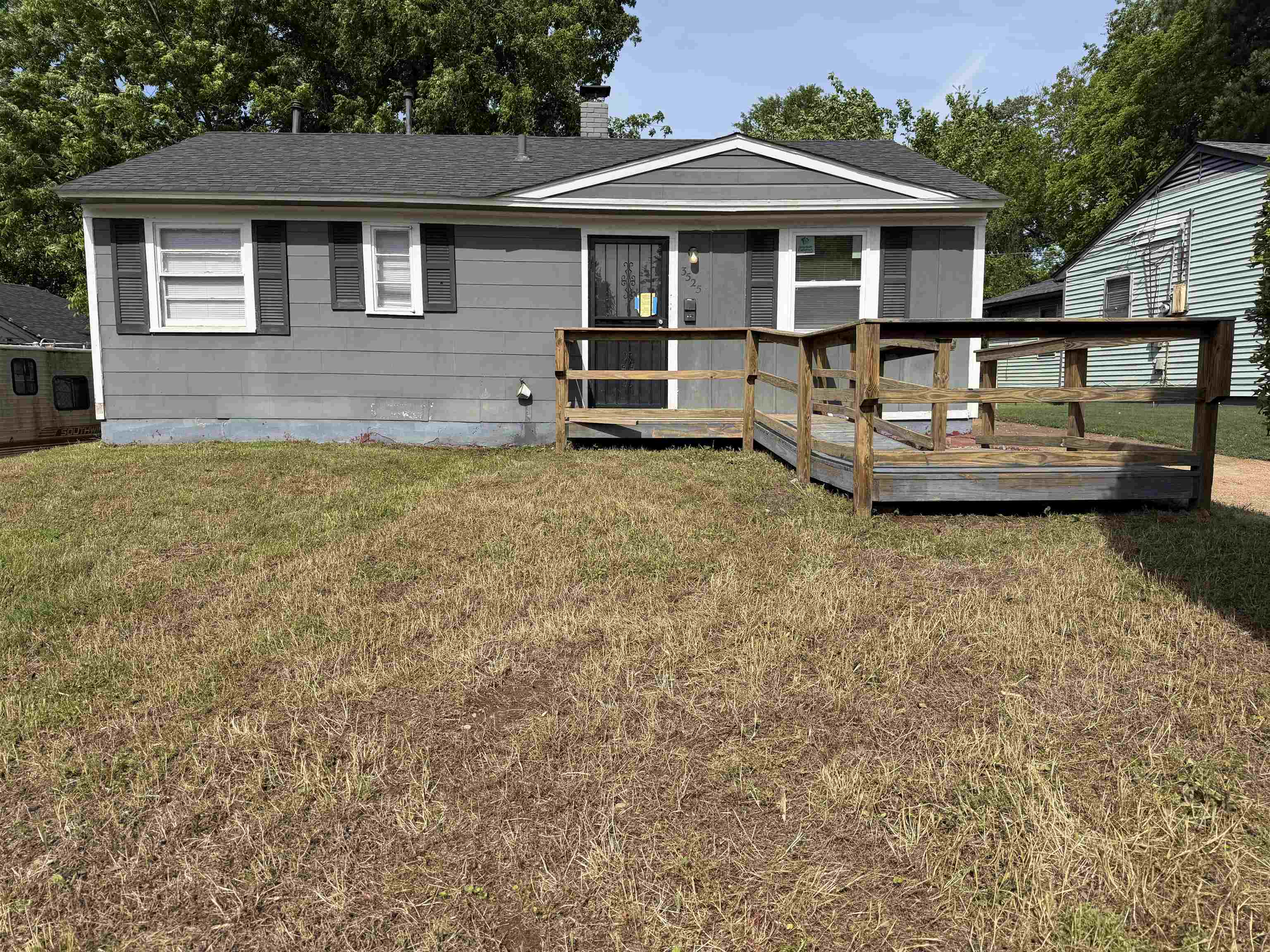 3525 Rochester Road Memphis, TN 38109 - Photo 1 of 10 Single-story residence featuring gray siding and a dark shingle roof
