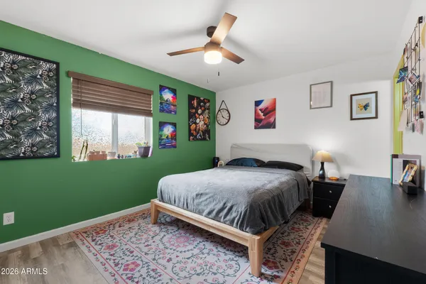 a kitchen with stainless steel appliances granite countertop a sink a stove and cabinets