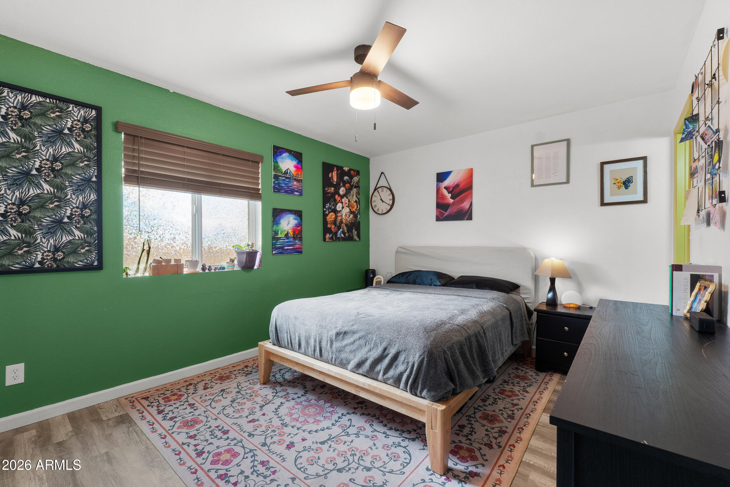 202 East Ruth Avenue, Unit 2 Phoenix, AZ 85020 - Photo 10 of 25 a bed room with a bed and a window