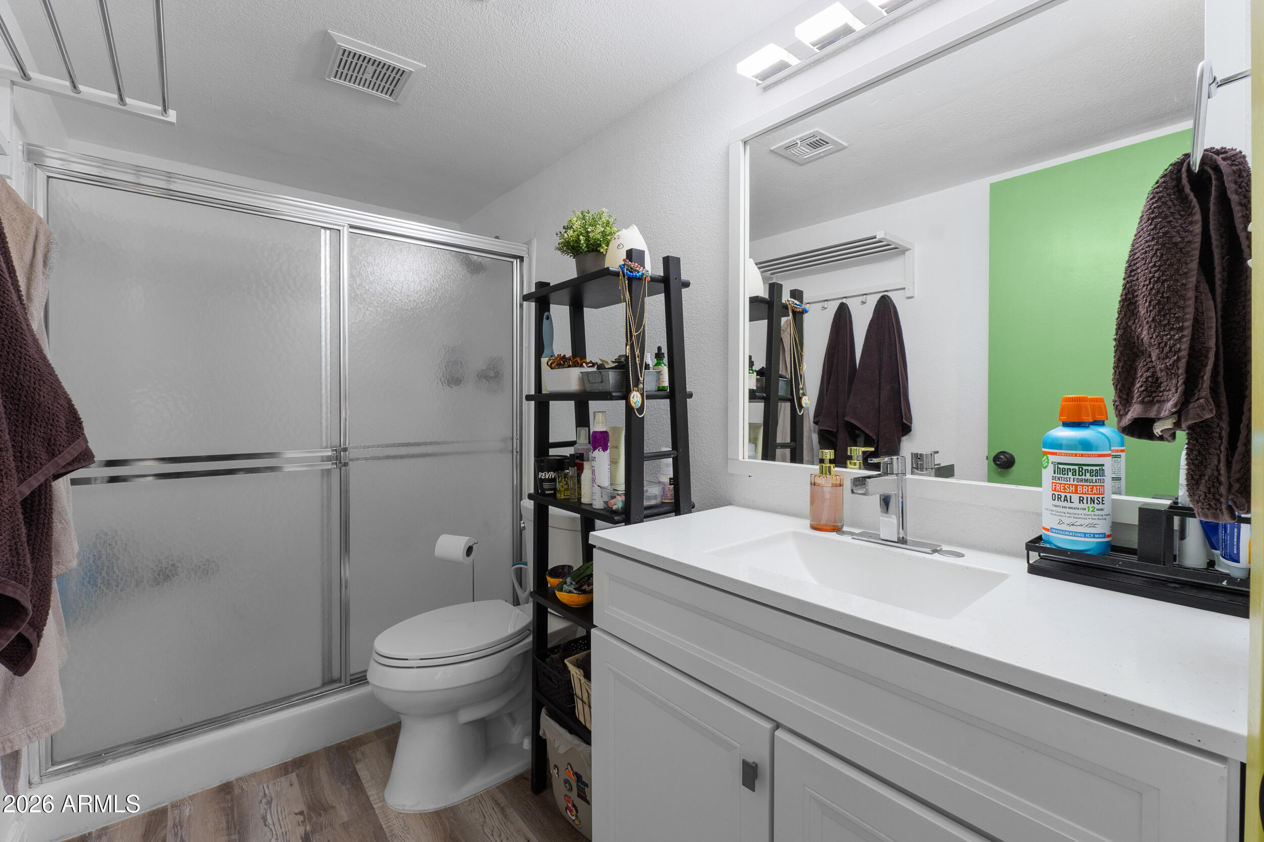 202 East Ruth Avenue, Unit 2 Phoenix, AZ 85020 - Photo 13 of 25 a bathroom with a toilet sink and shower