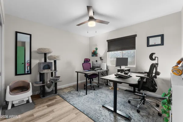 a bathroom with a toilet sink and shower