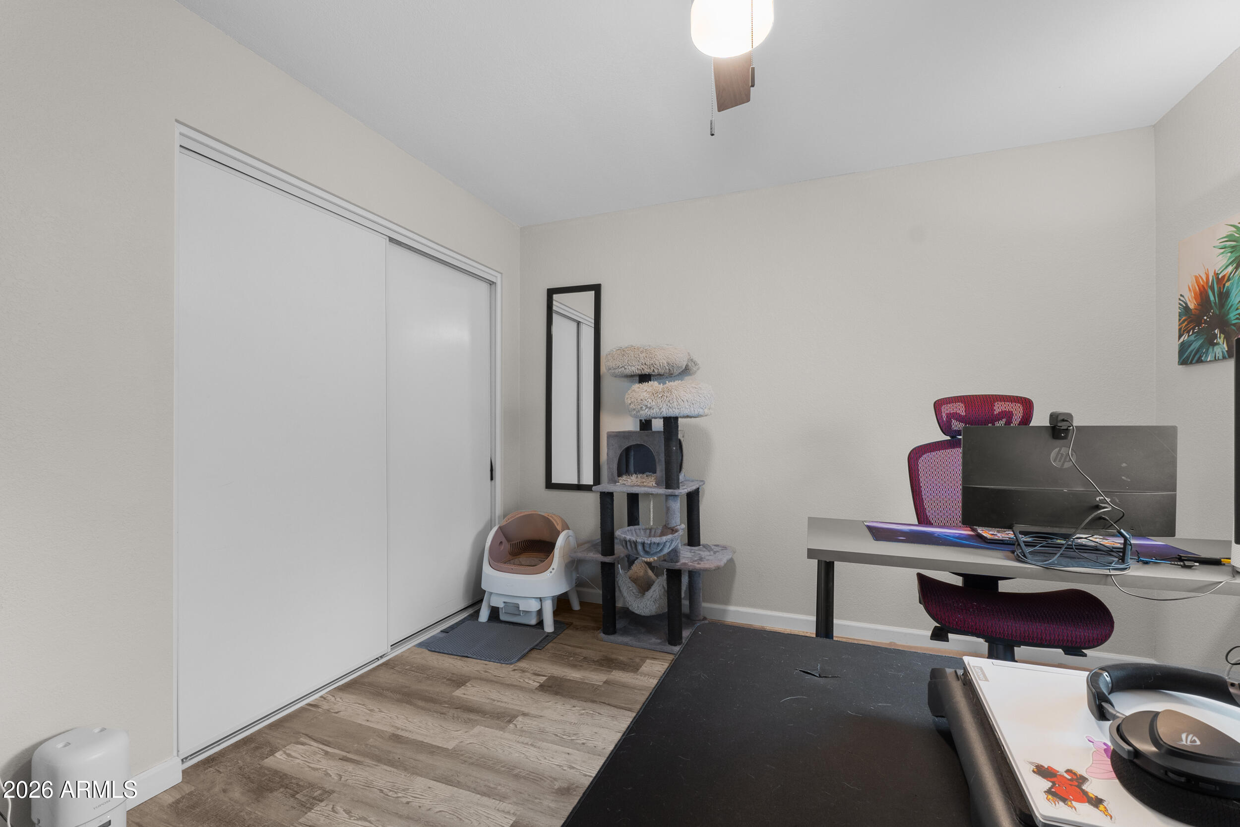 202 East Ruth Avenue, Unit 2 Phoenix, AZ 85020 - Photo 15 of 25 a view of a workspace with furniture and a window