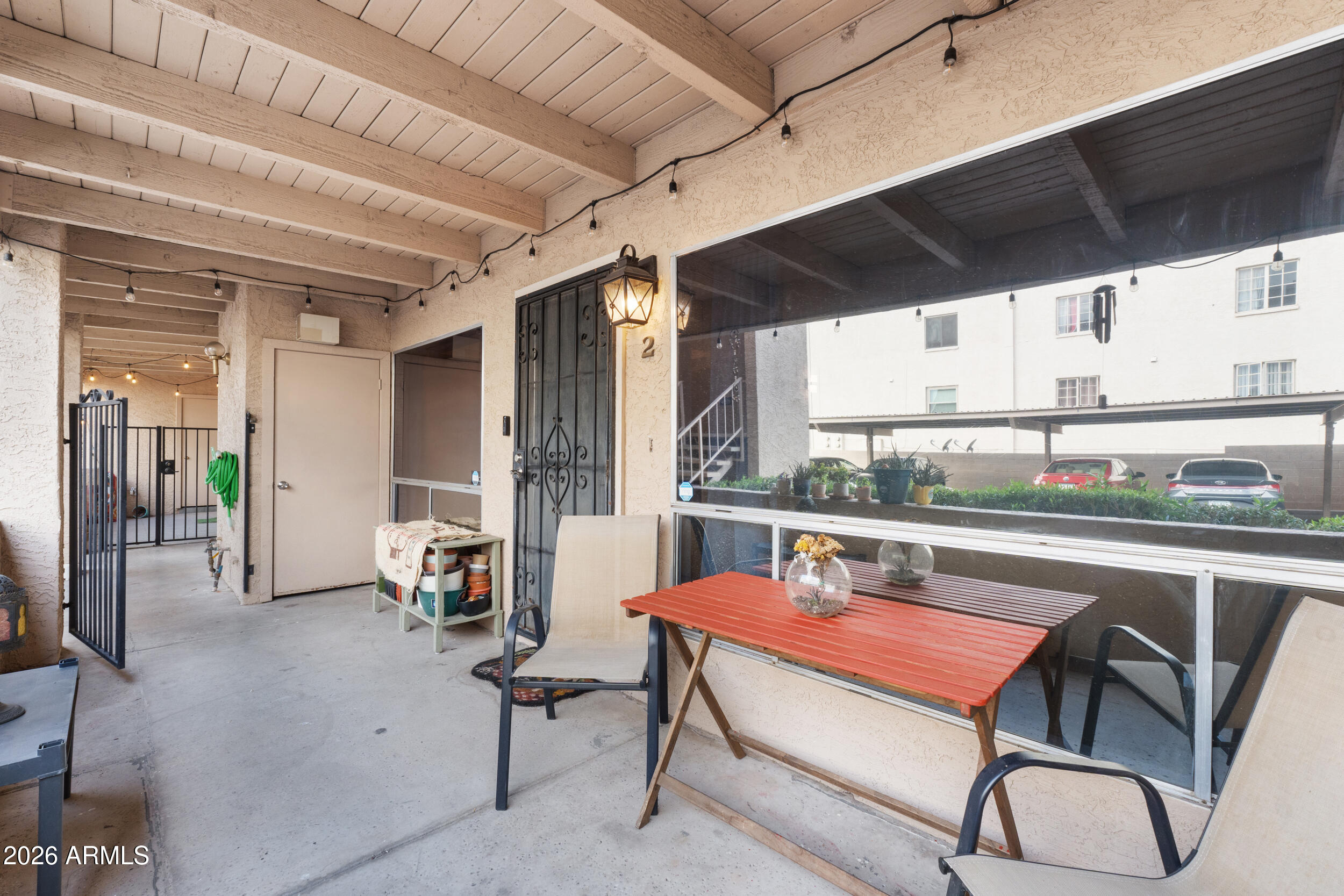 202 East Ruth Avenue, Unit 2 Phoenix, AZ 85020 - Photo 17 of 25 a living room with a table chairs and a table