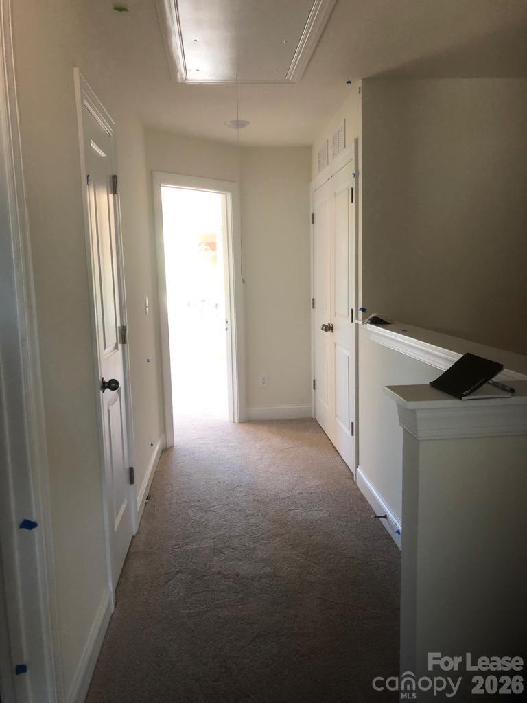 190 Waterlynn Ridge Road, Unit C Mooresville, NC 28117 - Photo 11 of 13 a view of hallway with closet