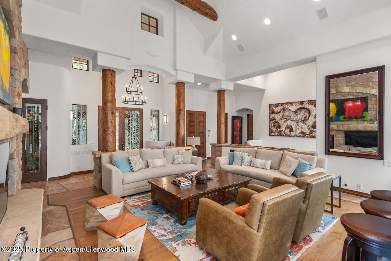 27 Timber Ridge Lane Snowmass Village, CO 81615 - Photo 17 of 40 a living room with furniture and a flat screen tv