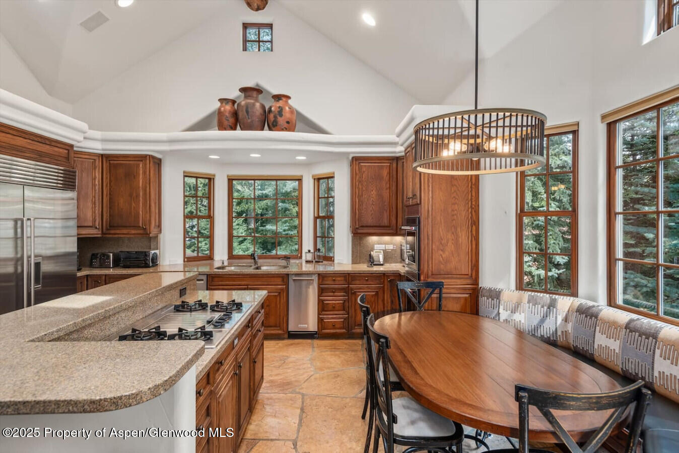 27 Timber Ridge Lane Snowmass Village, CO 81615 - Photo 22 of 40 a view of a dining room with furniture window and outside view