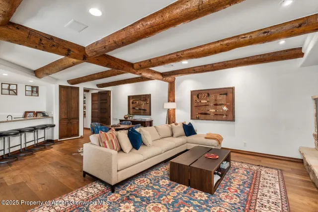 a bedroom with a large bed and a couch