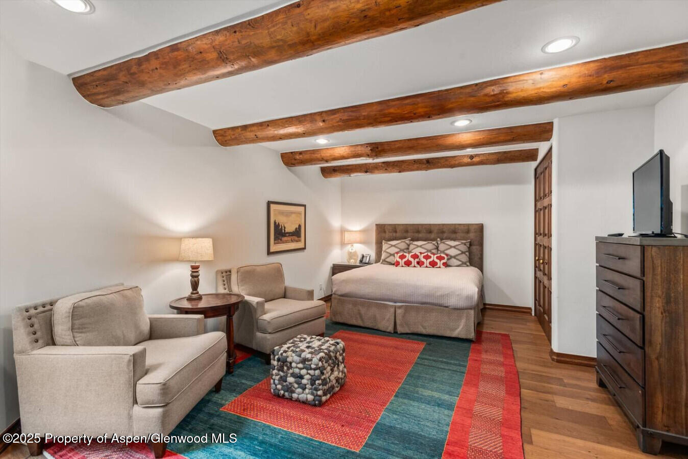 27 Timber Ridge Lane Snowmass Village, CO 81615 - Photo 29 of 40 a living room with furniture and a rug