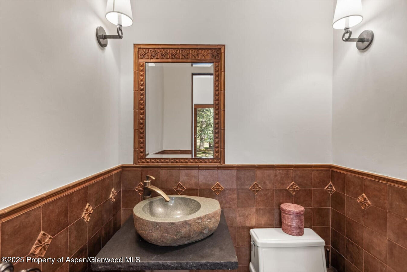27 Timber Ridge Lane Snowmass Village, CO 81615 - Photo 39 of 40 a bathroom with a sink and a mirror