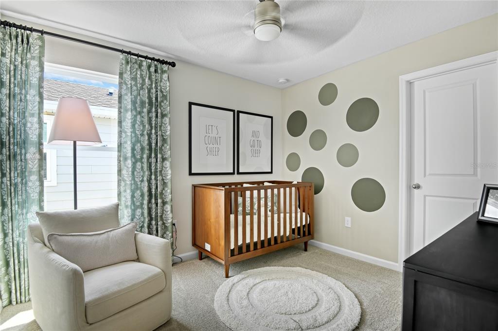 5131 Spring Maiden Circle Apollo Beach, FL 33572 - Photo 15 of 25 a living room with furniture and a window