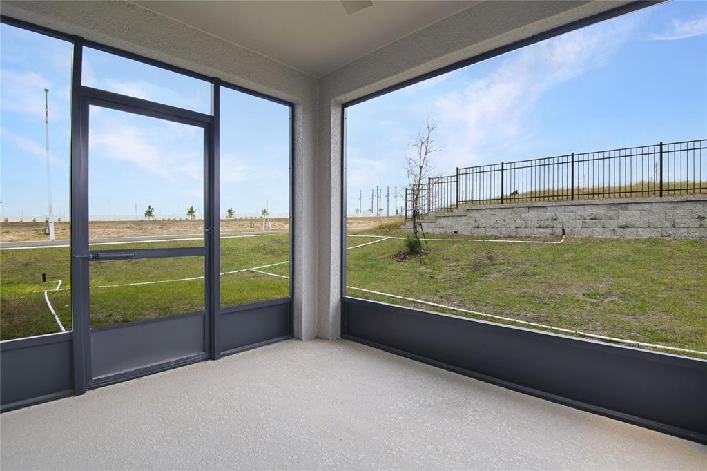 5131 Spring Maiden Circle Apollo Beach, FL 33572 - Photo 19 of 25 a view of a living room with a floor to ceiling window