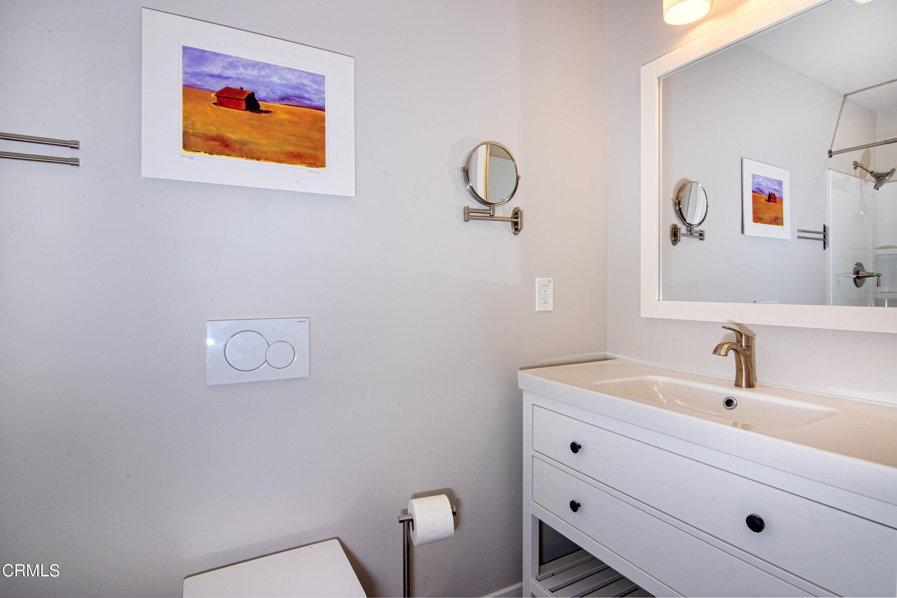 2901 Paloma Street Pasadena, CA 91107 - Photo 22 of 41 a bathroom with a sink and a mirror