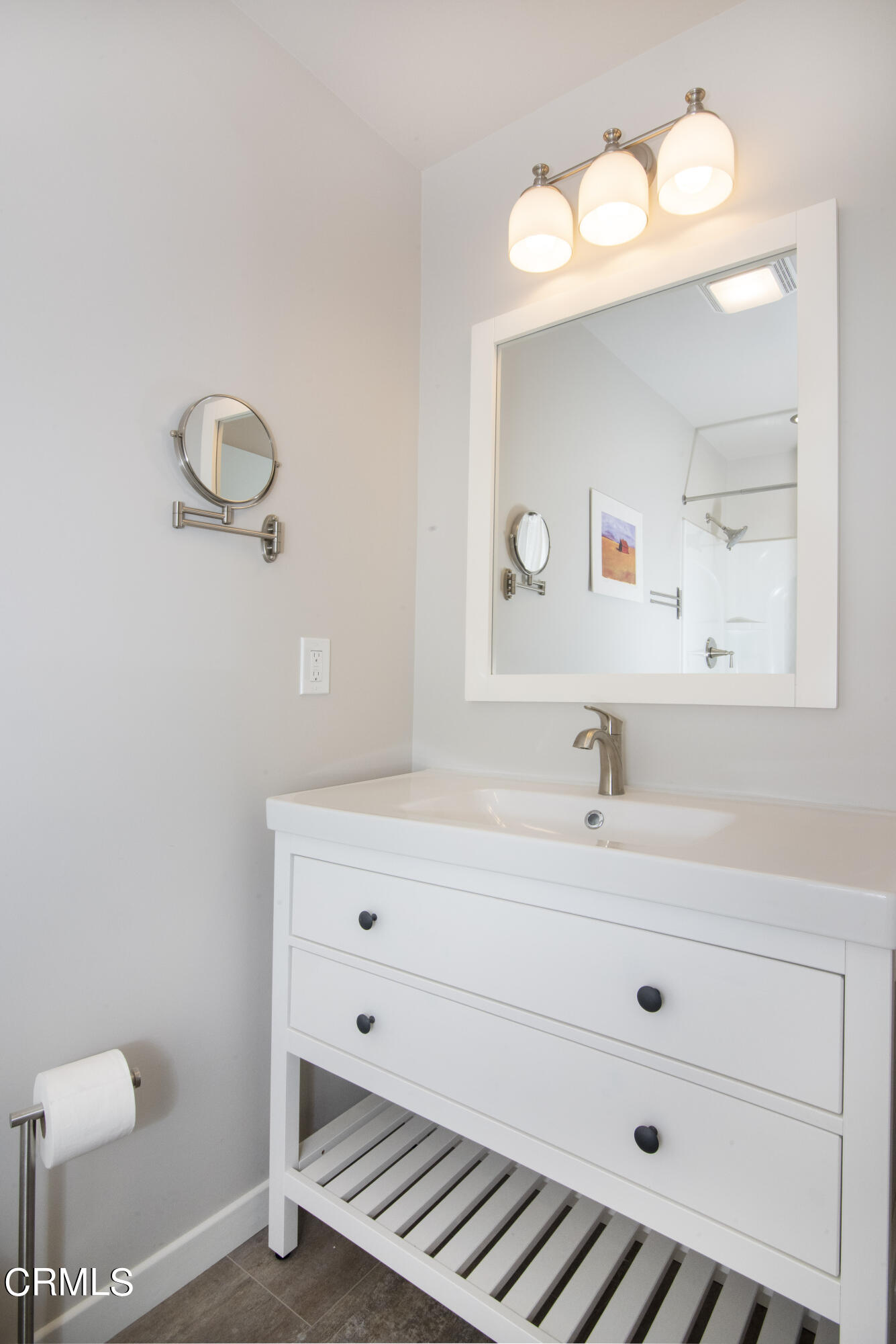 2901 Paloma Street Pasadena, CA 91107 - Photo 23 of 41 a bathroom with a sink and a mirror