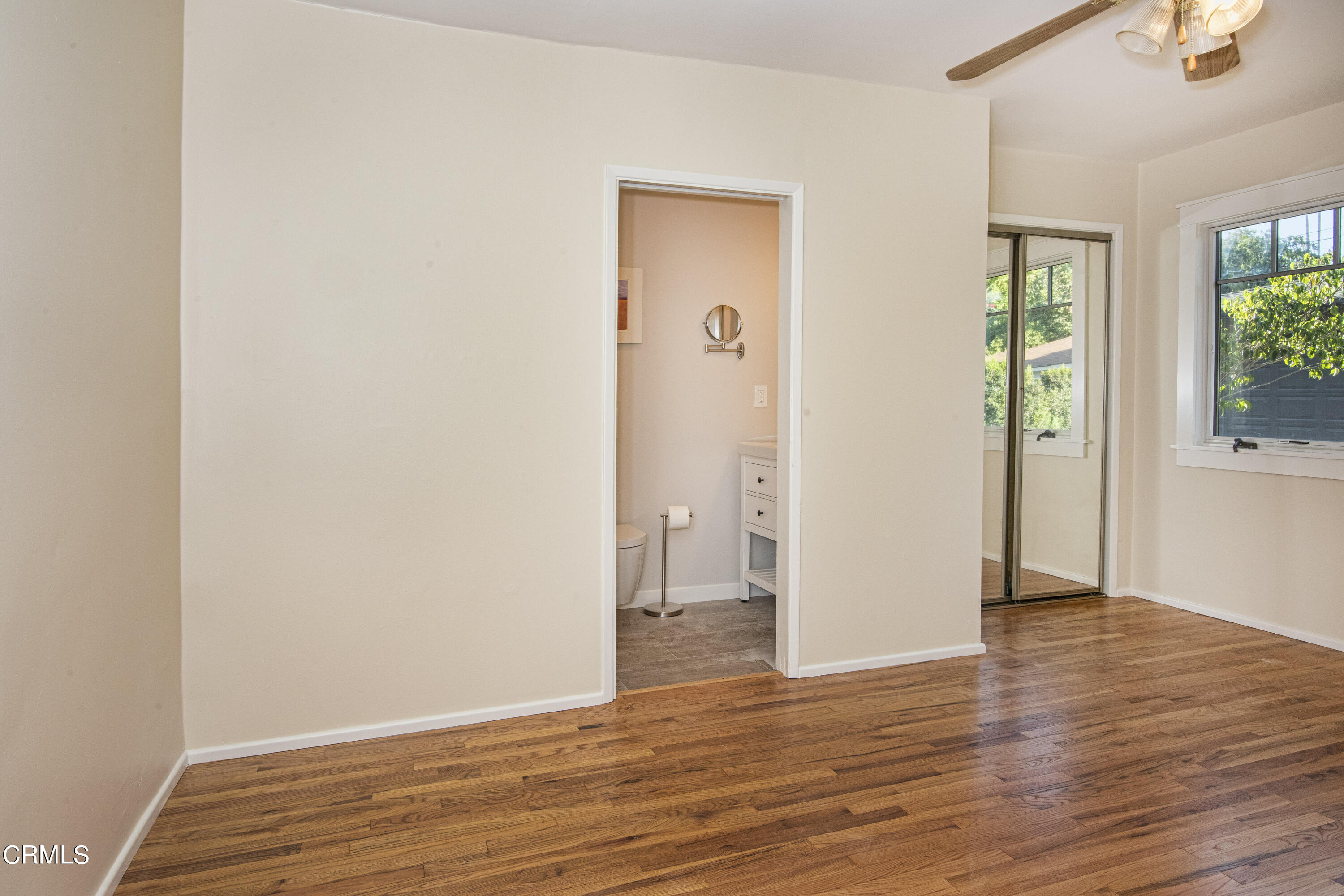 2901 Paloma Street Pasadena, CA 91107 - Photo 27 of 41 a view of an empty room with wooden floor and a window
