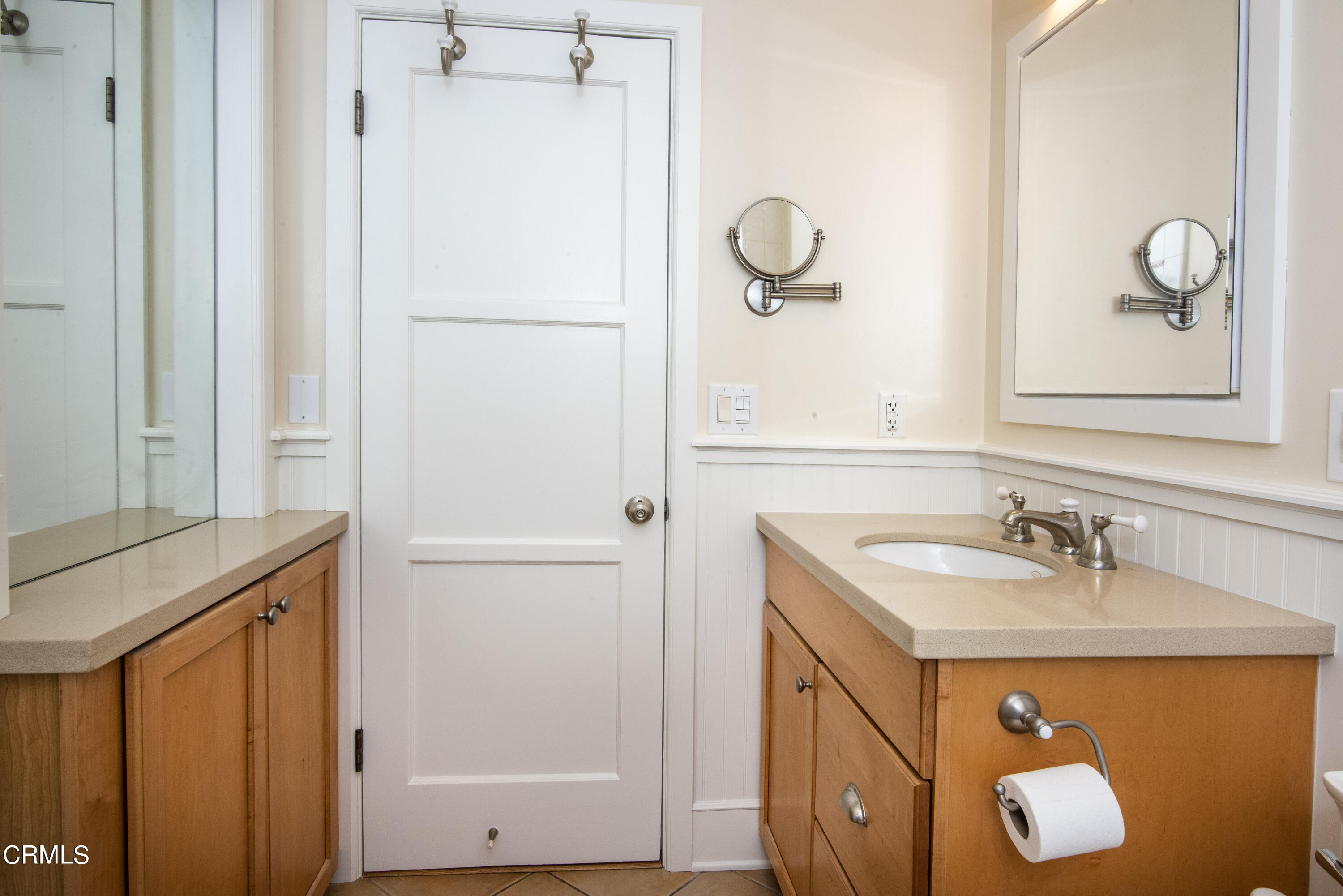 2901 Paloma Street Pasadena, CA 91107 - Photo 29 of 41 a bathroom with a sink and a mirror