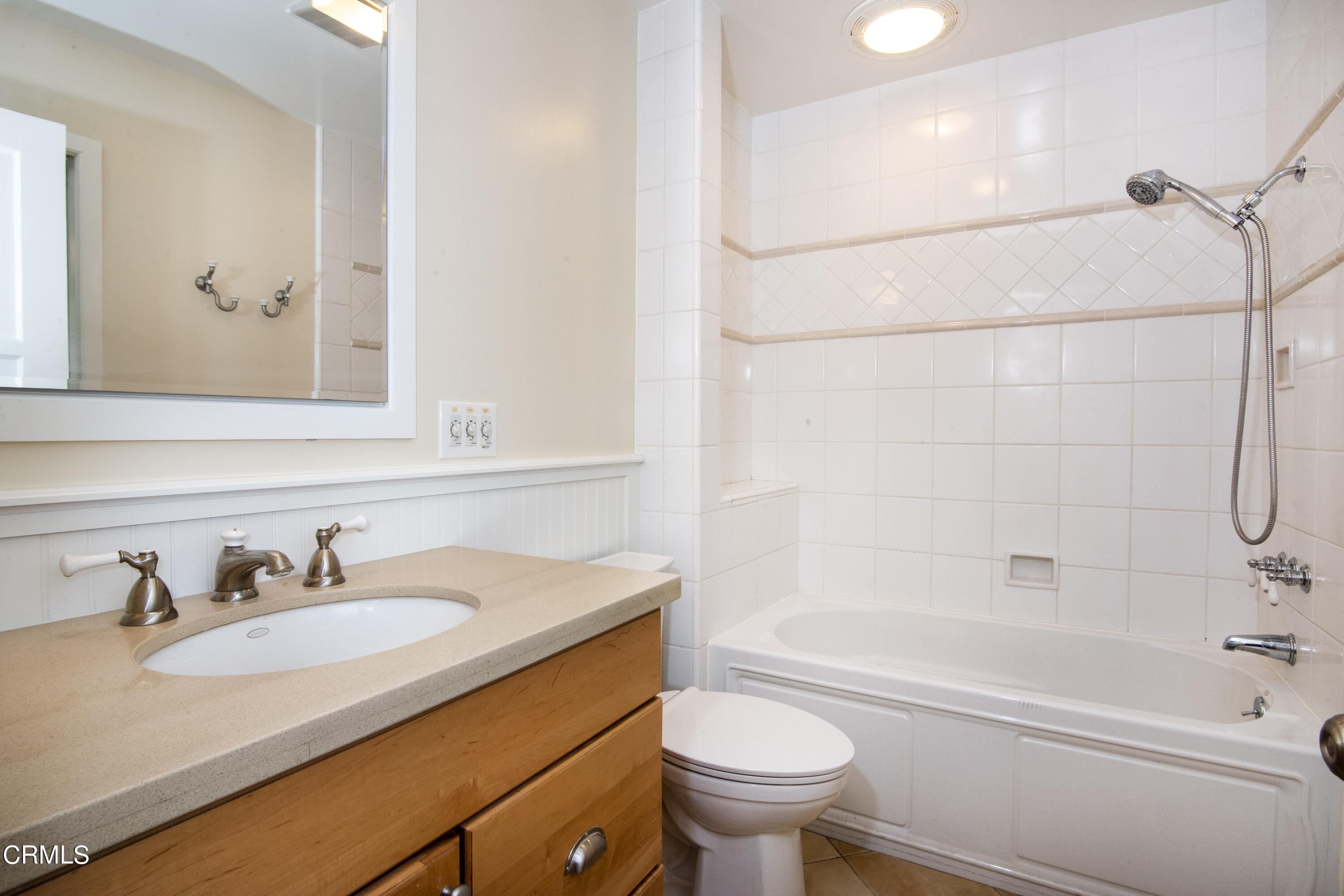 2901 Paloma Street Pasadena, CA 91107 - Photo 31 of 41 a bathroom with a granite countertop sink toilet and shower