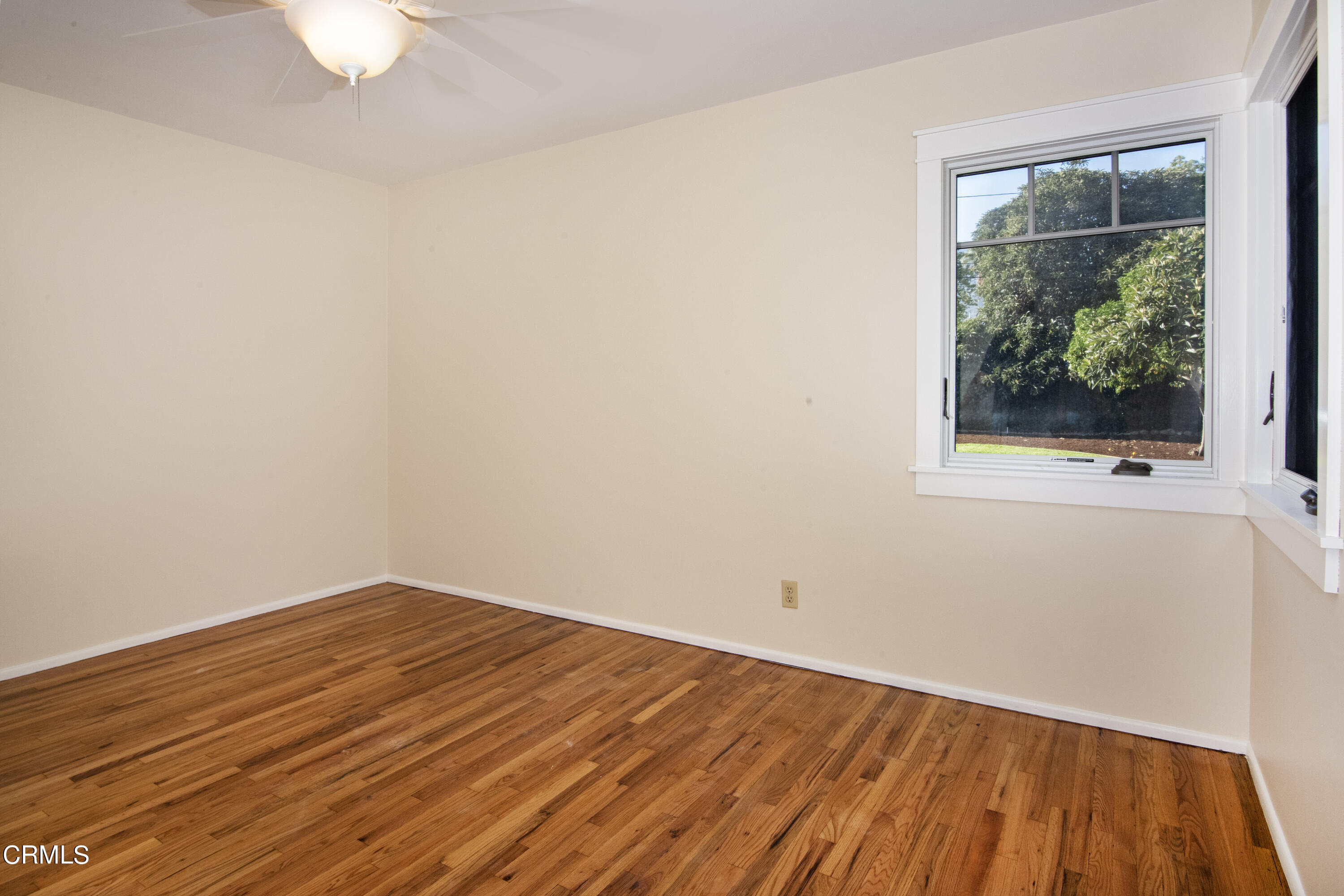 2901 Paloma Street Pasadena, CA 91107 - Photo 32 of 41 a view of a room with wooden floor and a window