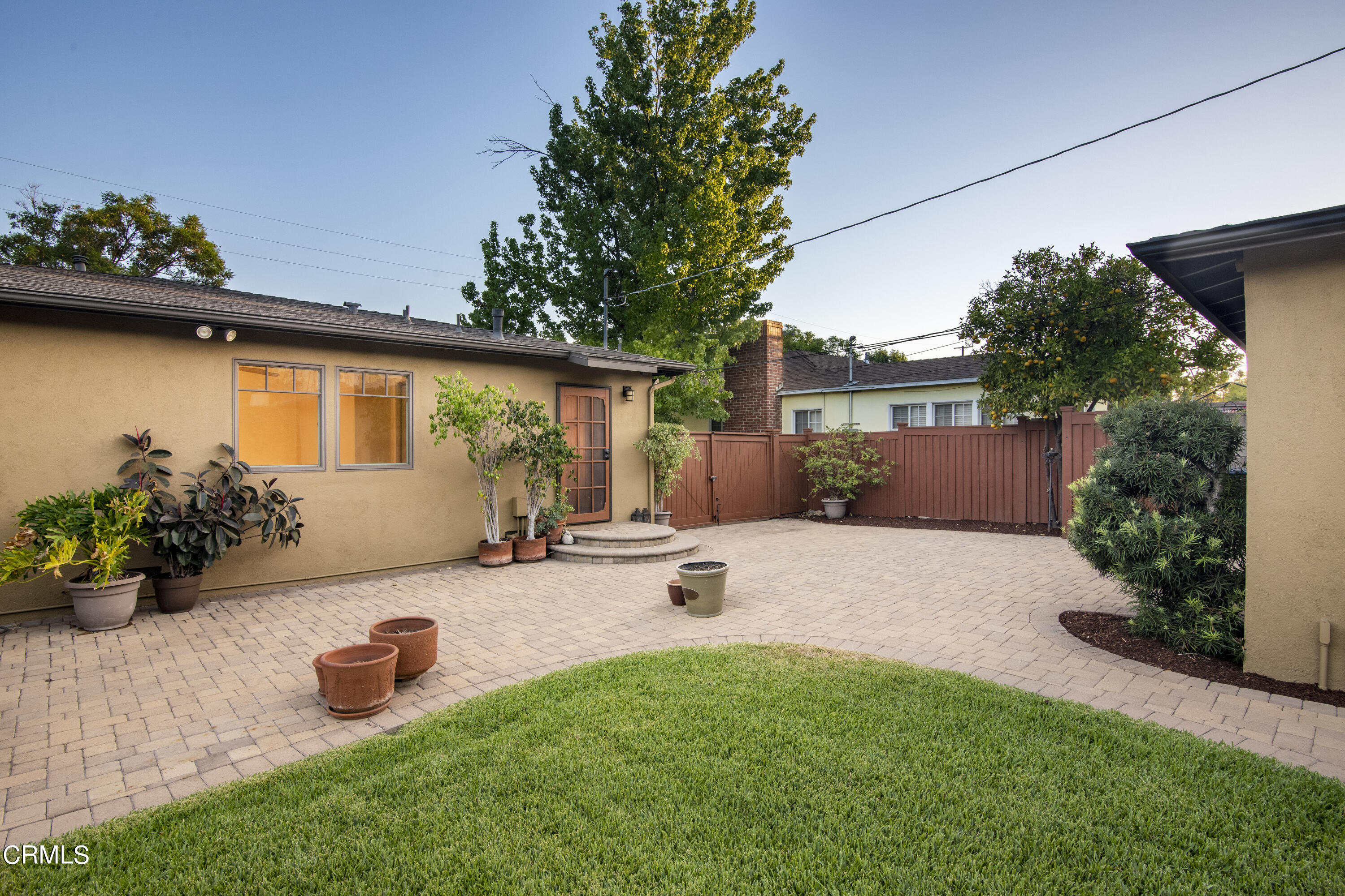 2901 Paloma Street Pasadena, CA 91107 - Photo 4 of 41 a view of a backyard with plants and a garden