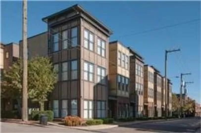 a view of a building along the street