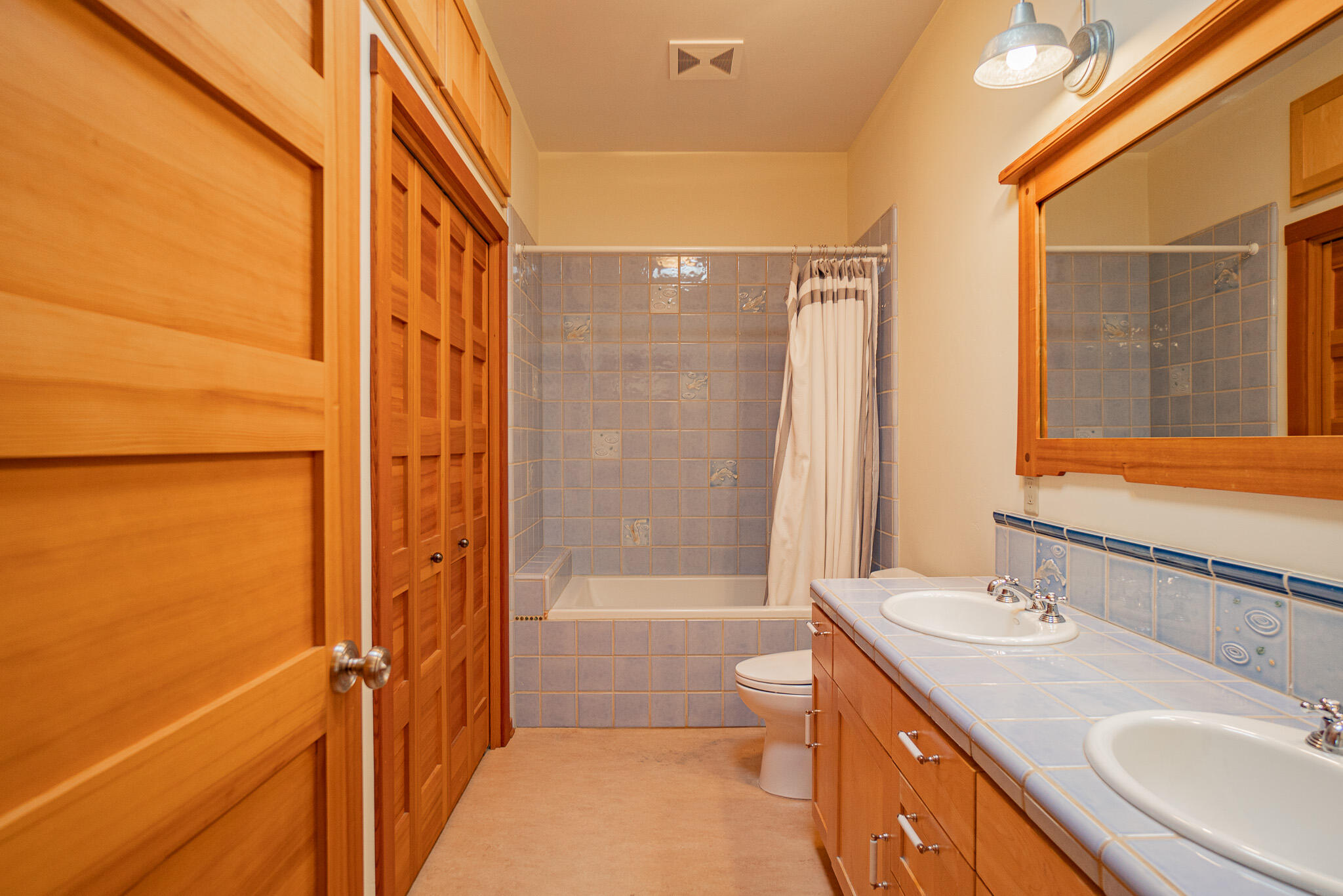 1785 Zemke Road Talent, OR 97540 - Photo 27 of 61 a bathroom with a granite countertop sink toilet and shower