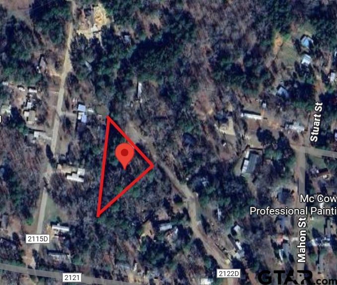 a street sign that is on a tree